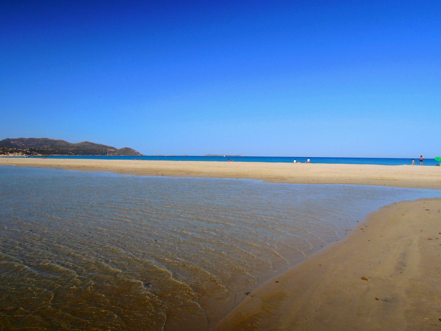 Porto Giunco Spiaggia e Stagno